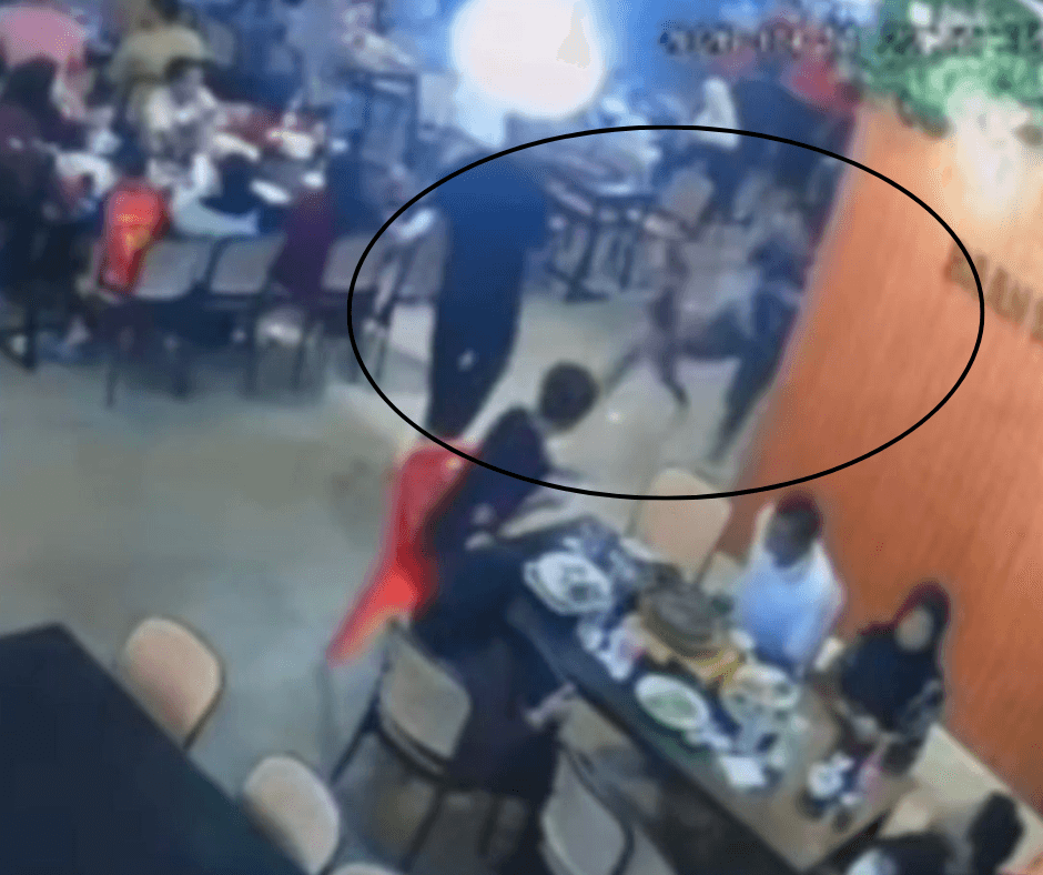 Tangkap layar daripada video memaparkan kekasaran didakwa dilakukan seorang lelaki.